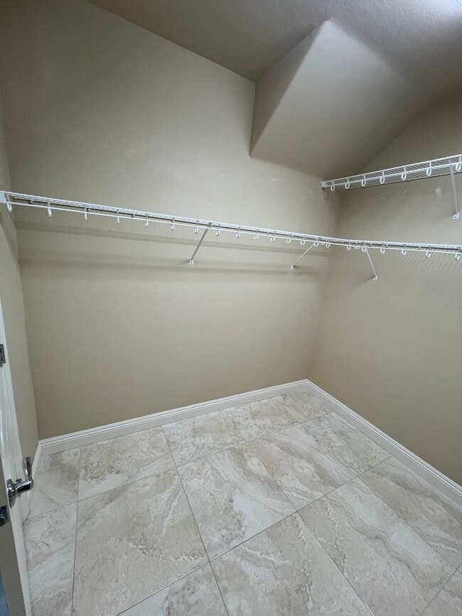 Building Photo - A Fantastic 4 Bedroom Home with the primary Downstairs, in Silverado Ranch