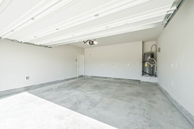 Building Photo - Experience luxury in this never-lived-in Beazer home located in the desirable Montgomery Ridge co...