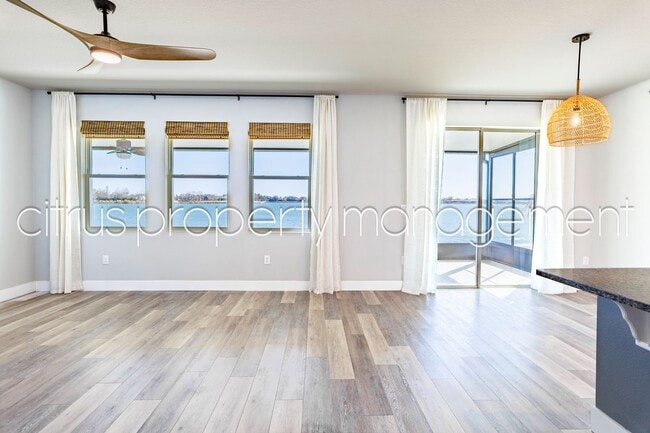 Building Photo - Stunning Double Waterfront 4/3 Home with Dock and Electric Boat Lift