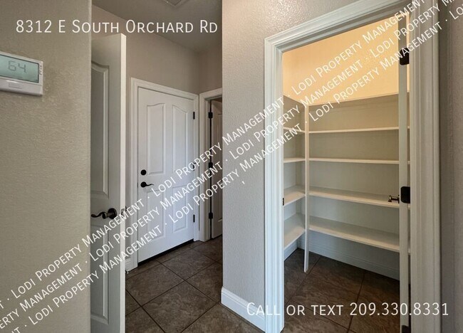 Building Photo - 8312 E Orchard Rd
