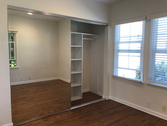LARGE SLIDING MIRRORED CLOSET - 10878 National Blvd