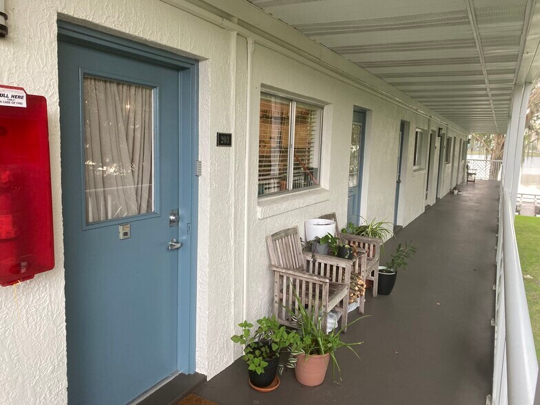 Cute blue doors to living room and kitchen. - 320 Lakeview St