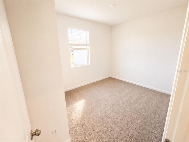 Building Photo - 3309 Canna Lily Pl