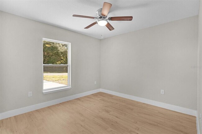 Building Photo - 9170 N Travis Dr