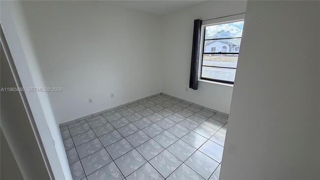 Building Photo - 6622 SW 148th Pl