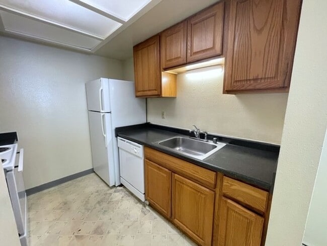 Building Photo - East Anchorage Condo with Laminate Floorin...