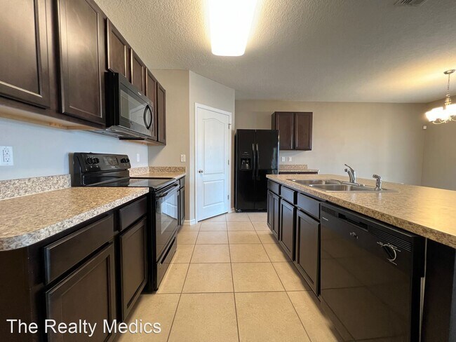 Building Photo - 4 br, 2 bath House - 1665 Laurel Oaks Dr