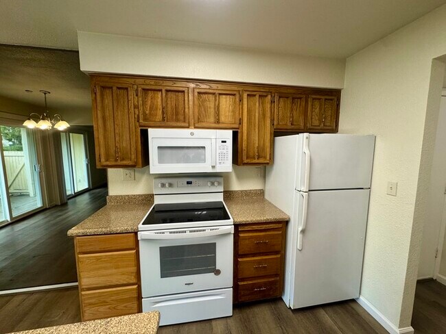 Building Photo - Beautiful Downstairs 2 Bedroom Condo Located In Gated Community Pool + Lake Access!
