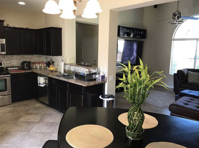 Kitchen and living room - 16129 N 21st Ln