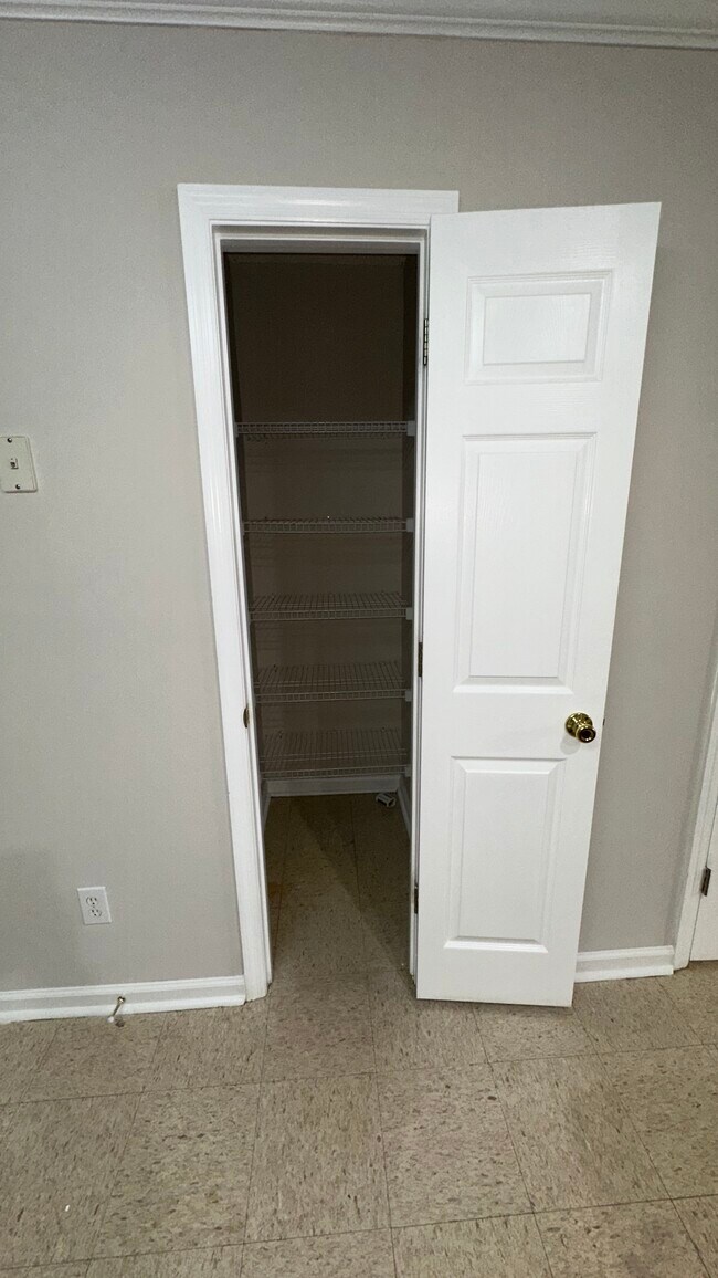 Kitchen has a walk-in pantry. - 1211 Goldridge Dr SW