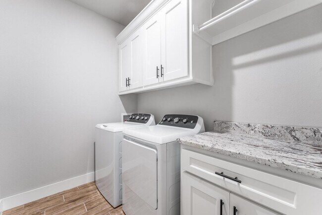 Building Photo - Welcome to this stunning 3-bedroom, 2-bathroom home that boasts a range of high-quality features ...