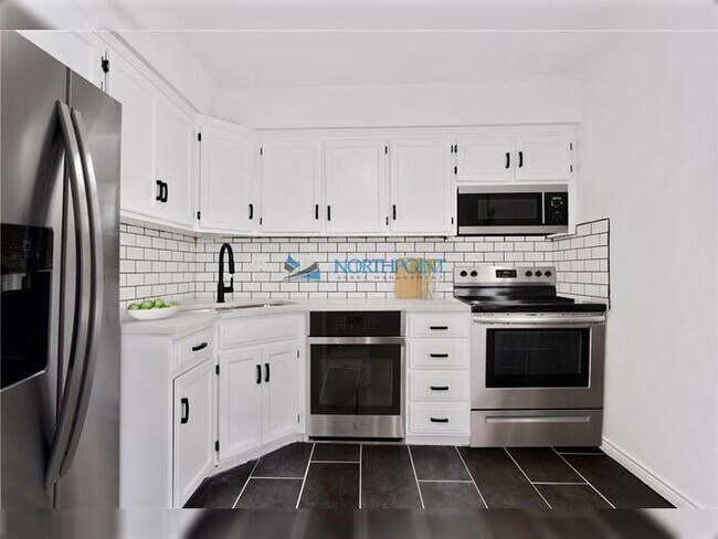 Building Photo - Beautiful 4BR  2BA Home w/ Garage • Big Yard in Camwood