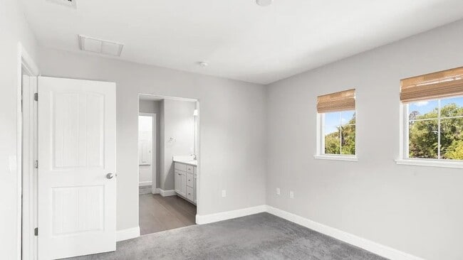Building Photo - Spacious 5-Bedroom Home with Room to Live, Work & Relax
