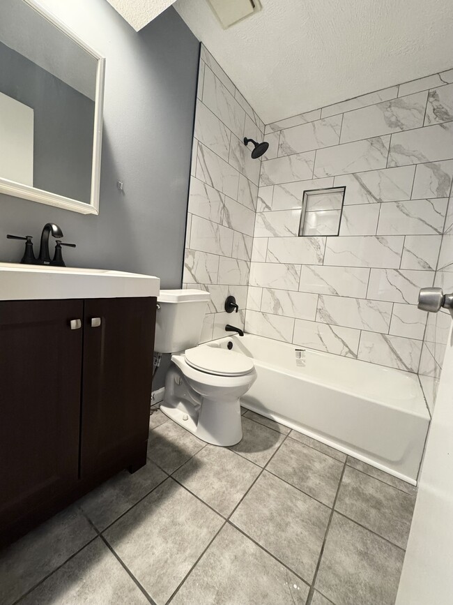 Newly remodeled bathroom - 518 E 97 Terrace