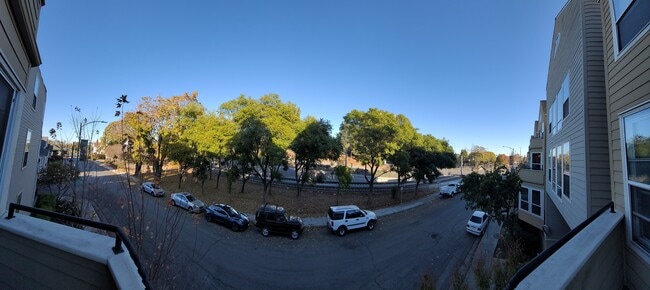 panorama view light rail across street - 411 Park Ave