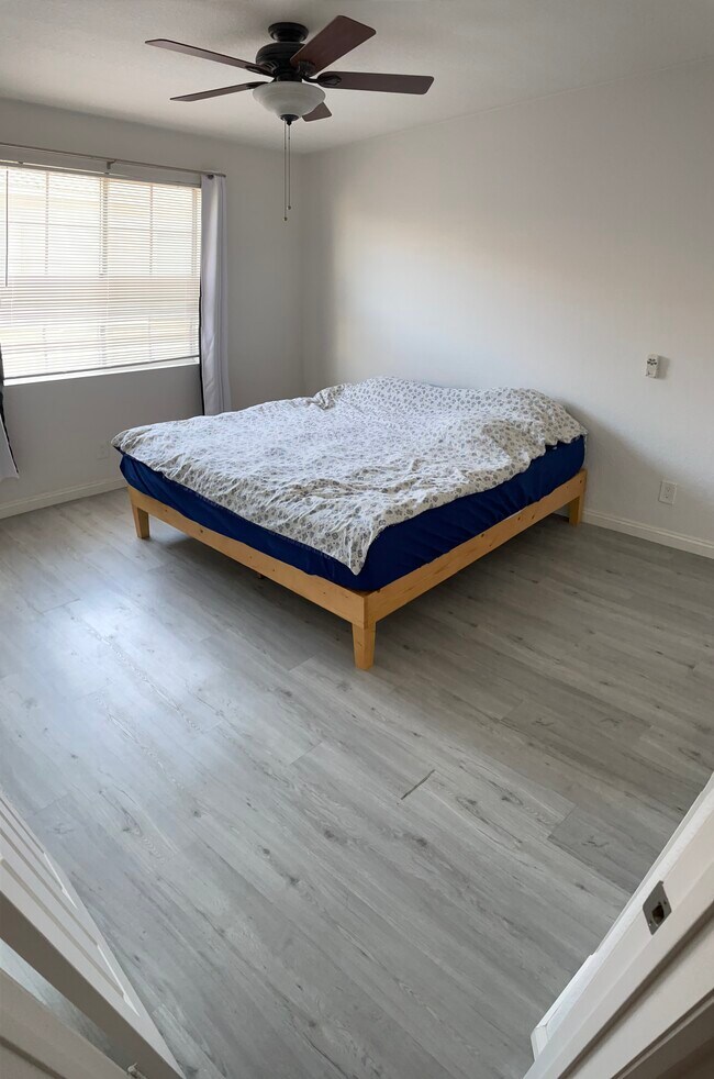 Master bedroom (king bed in photo) - 21832 S Vermont Ave
