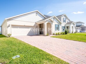 Building Photo - Coming soon!!!!-Discover Your Pristine Sanctuary at Trinity Place!!-5895 Vision Road St. Cloud, F...