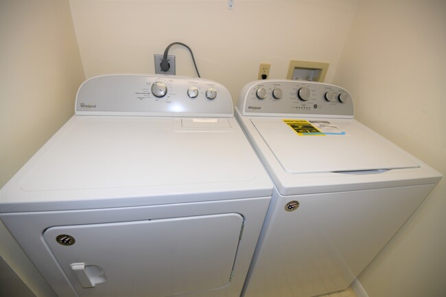 In-suite large capacity washer & dryer. - 1935 Silver Pine SW Way