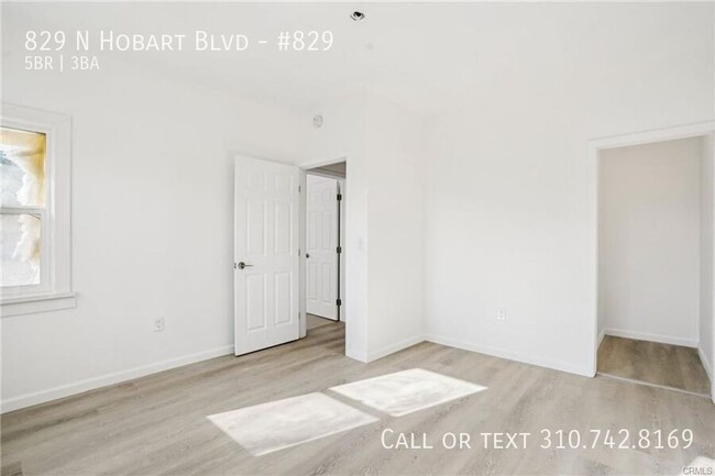 Building Photo - Luxe Living at 825 N. Hobart Blvd. – Where...