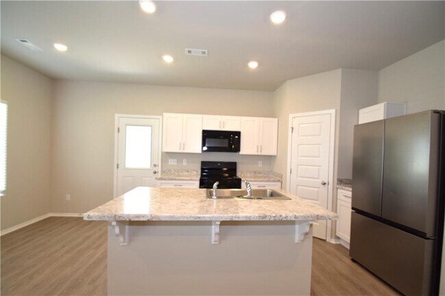 Building Photo - 6804 Devotion Ave
