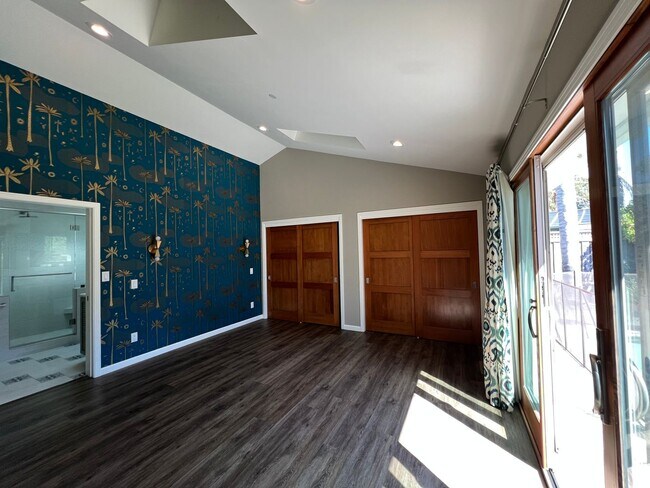 Building Photo - Spacious 4-Bedroom Retreat Just Steps from...