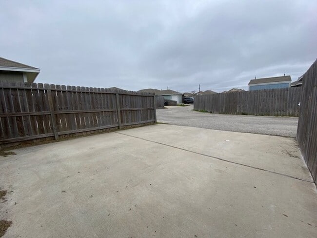 Building Photo - WELCOME TO YOUR CHARMING HOME AT THE COTTA...