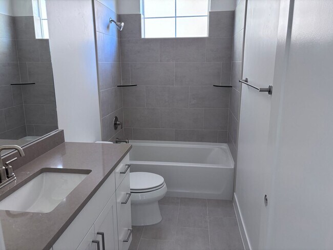 Building Photo - new single story 4 bed 3 bath with 3 car garage and community swimming pool