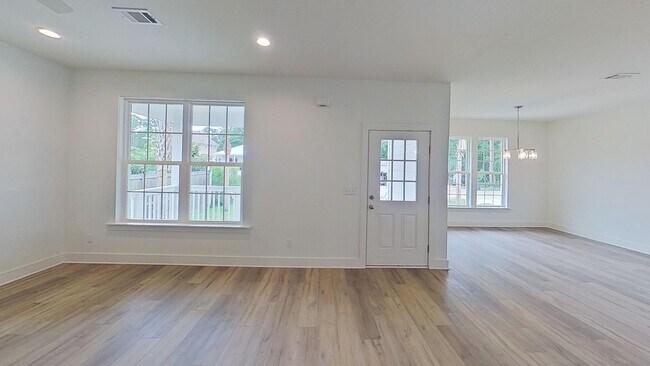 Building Photo - New build! 3/2 with backyard storage shed