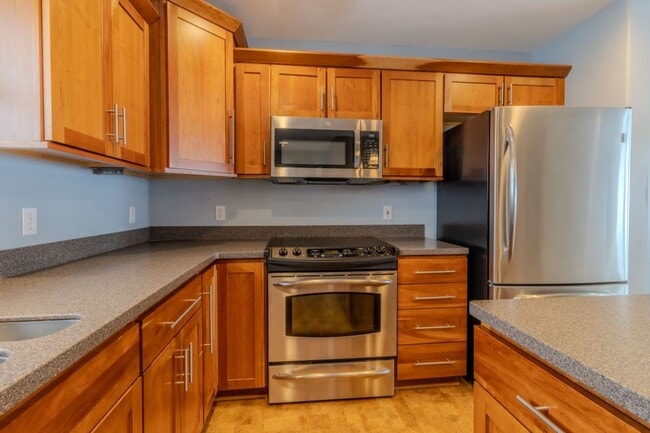 Building Photo - Modern Living Meets Cozy Charm