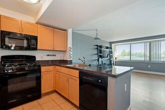 Building Photo - Available Now! Electric, Gas and Water included in Rent! Spacious Studio in an Amenity Rich Build...