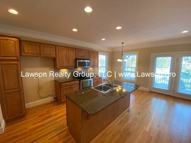 Building Photo - Colonial Green Row Home with Two Car Garage