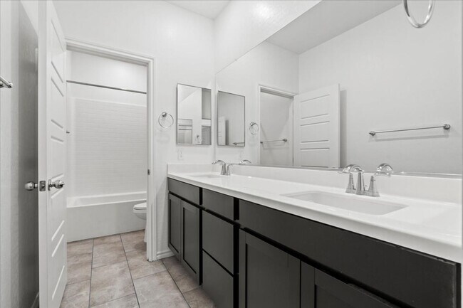 Building Photo - Spacious 5-bedroom home in gated community
