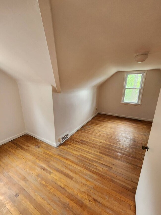 Building Photo - Move-In Special: Save $300 on This Charmin...