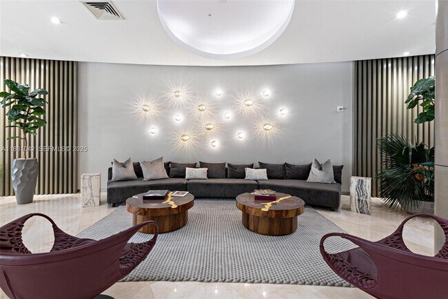 Building Photo - 10275 Collins Ave