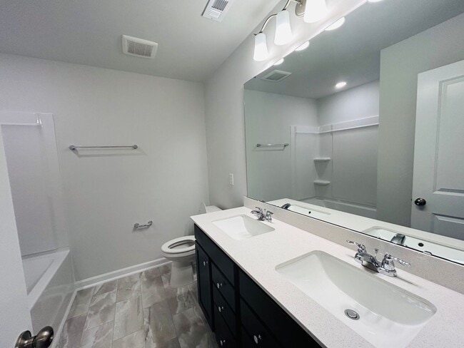 Building Photo - Stunning new end-unit 3 bedroom 2.5 bath townhouse in N High Point with attached garage.