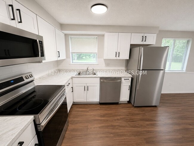 Building Photo - 6052 Holiday Ln