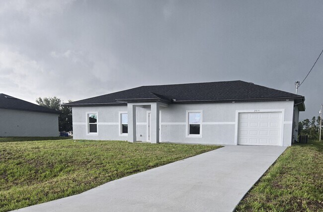 Building Photo - BRAND NEW THREE BEDROOM, 2 BATH, 1 CAR GAR...
