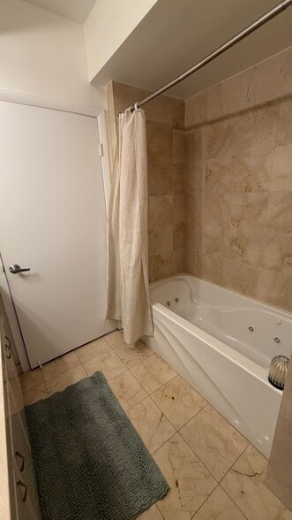 Building Photo - 6365 Collins Ave