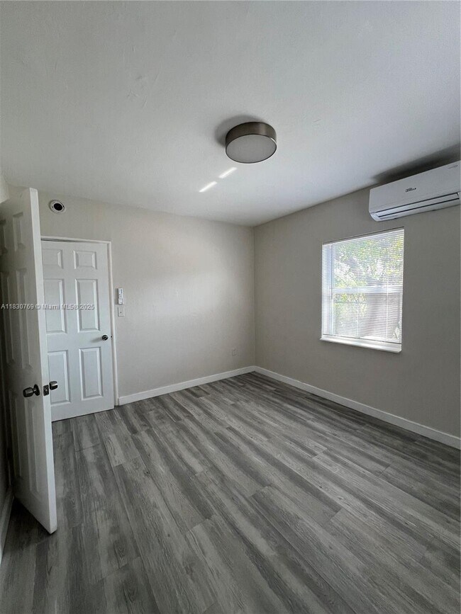 Building Photo - 150 NE 59th St