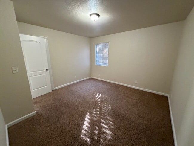 Building Photo - New Paint AND a Yard with a picket fence!