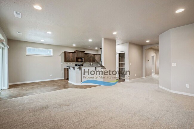 Building Photo - 3 Bedroom 2 Bath Home with 2-Car Attached ...
