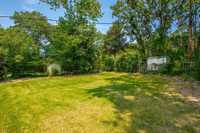 Building Photo - Welcome to a beautifully maintained 4-bedroom, 2-bathroom home located in the highly sought-after...