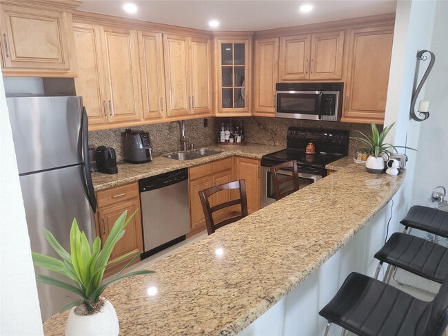 Building Photo - 19370 Collins Ave