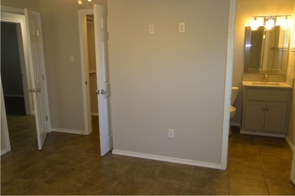 Master Bedroom with Bathroom and Walk-in Closet - 4115 Robinhood Dr