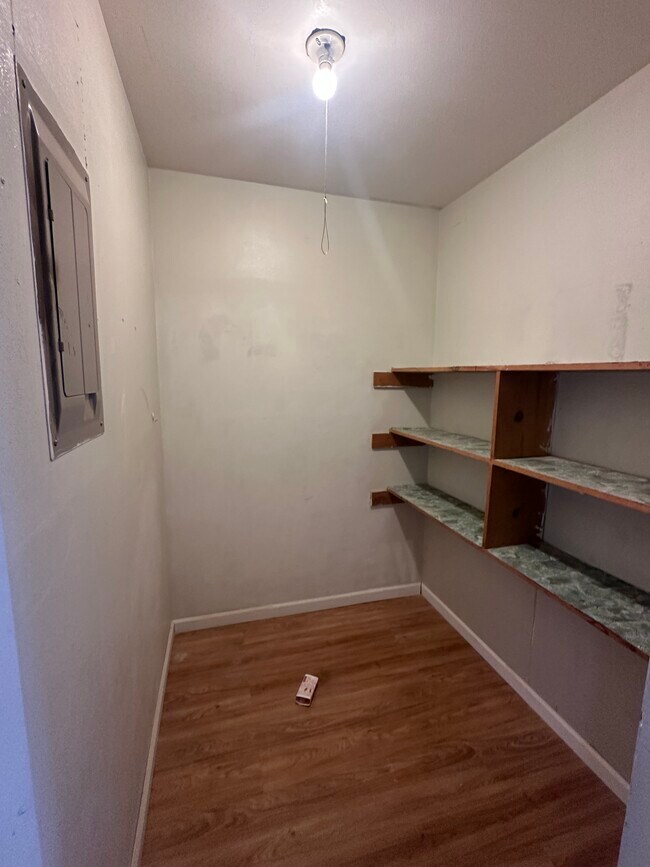 Additional large storage room provides ample storage options. - 327 M St