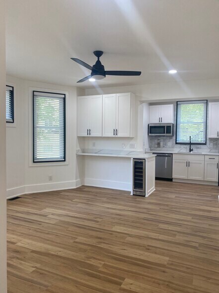 Wrap around bar with beverage fridge - 3409 Fernside Pl