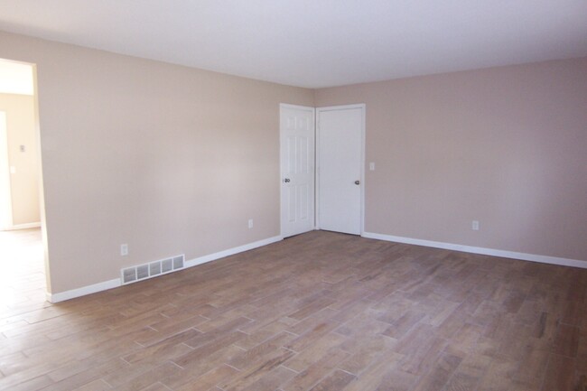 Living Room with Wood Plank tile - 4773 Lorraine Ave