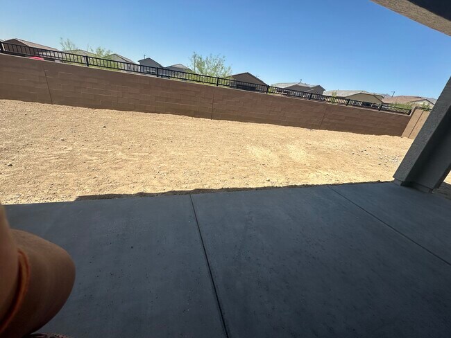 Large covered area with wide and large backyard - 3110 N 199th Dr