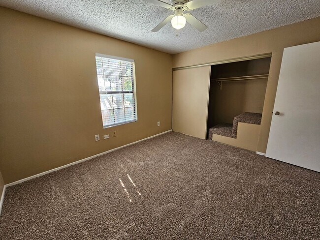 Building Photo - Stunning two-level, two-bedroom, one-and-a-half-bathroom townhome