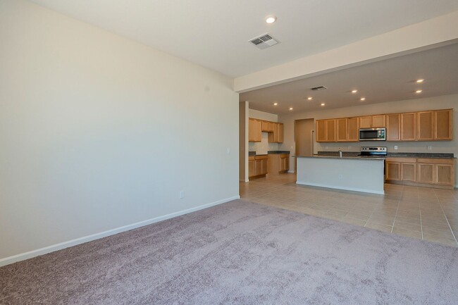 Building Photo - Beautiful New Spacious Home Includes 3 car...